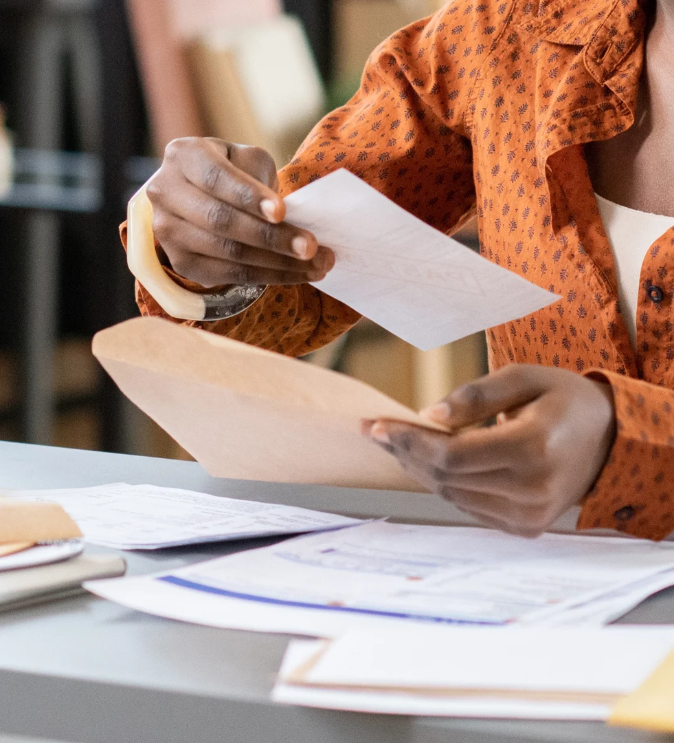 A women looking over documents and letters